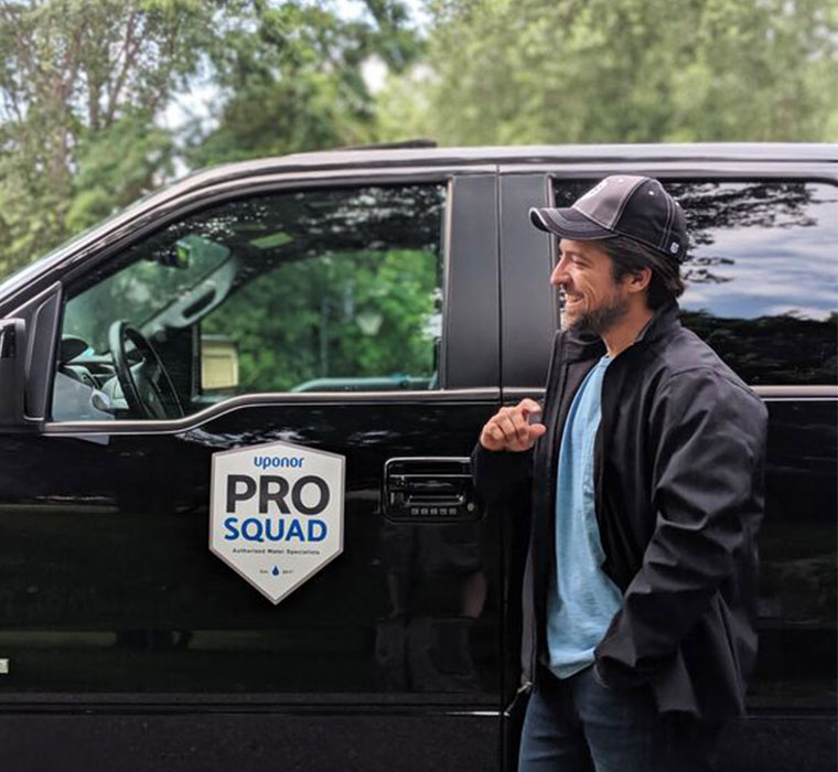 A profile image of an Uponor Pro Squad member standing outside his truck