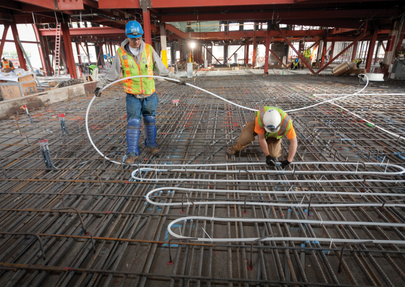 commercial general contractors installing Uponor radiant heating and cooling systems at Pier 15
