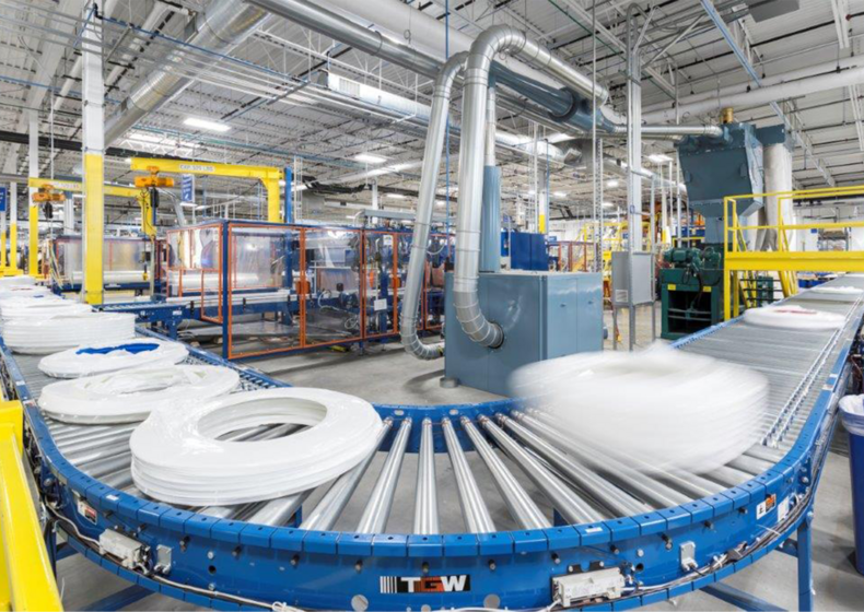 An image of the Uponor Annex conveyor belt packaging coils of PEX