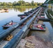 Emergency pipeline on a pontoon bridge