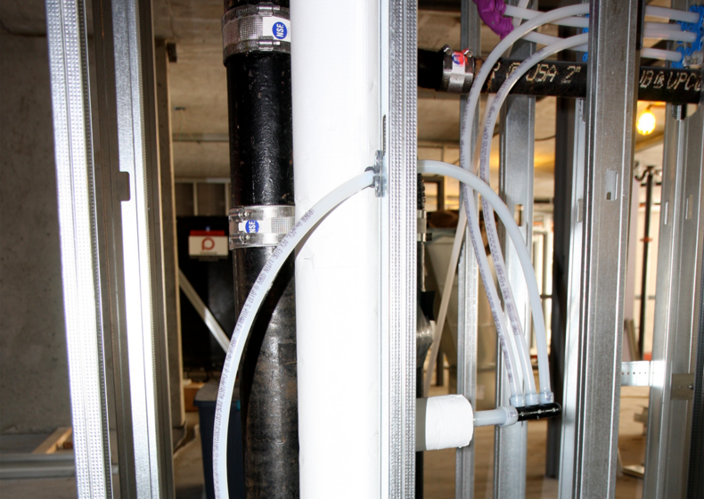 Uponor PEX plumbing installation at the Radisson Blu hotel in Minneapolis, MN featuring multiport tee